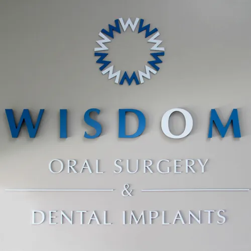 Wisdom Oral Surgery & Dental Implants office sign