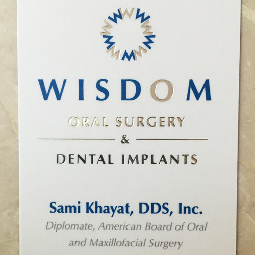 Wisdom Oral Surgery & Dental Implants office sign